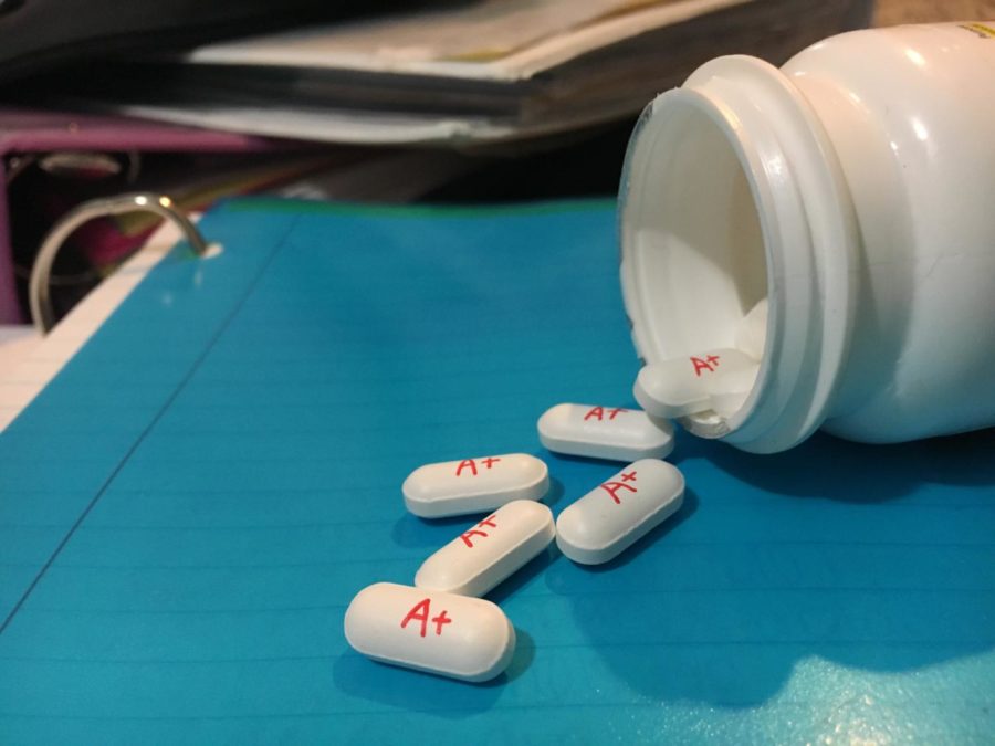 Many students will do whatever they can to receive a good grade. The A+ pills represent the addictive side of this craving, which many students face.