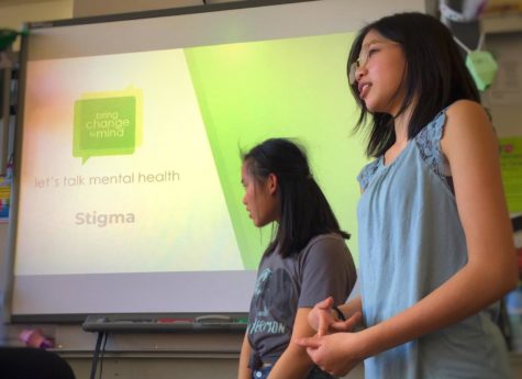 BC2M Club President Mackenzi Rauls and Vice President Emma Lee give a presentation about mental illness to their club members during one of their Tuesday lunch meetings in room C14.