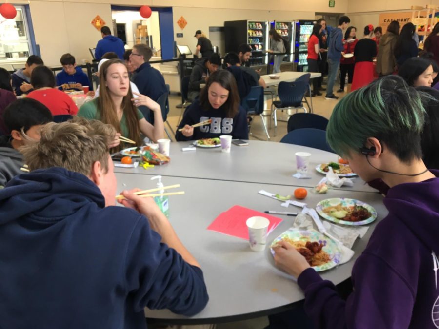Student who take a Chinese language class celebrate Chinese New Year by learning about the culture and enjoying a meal.
