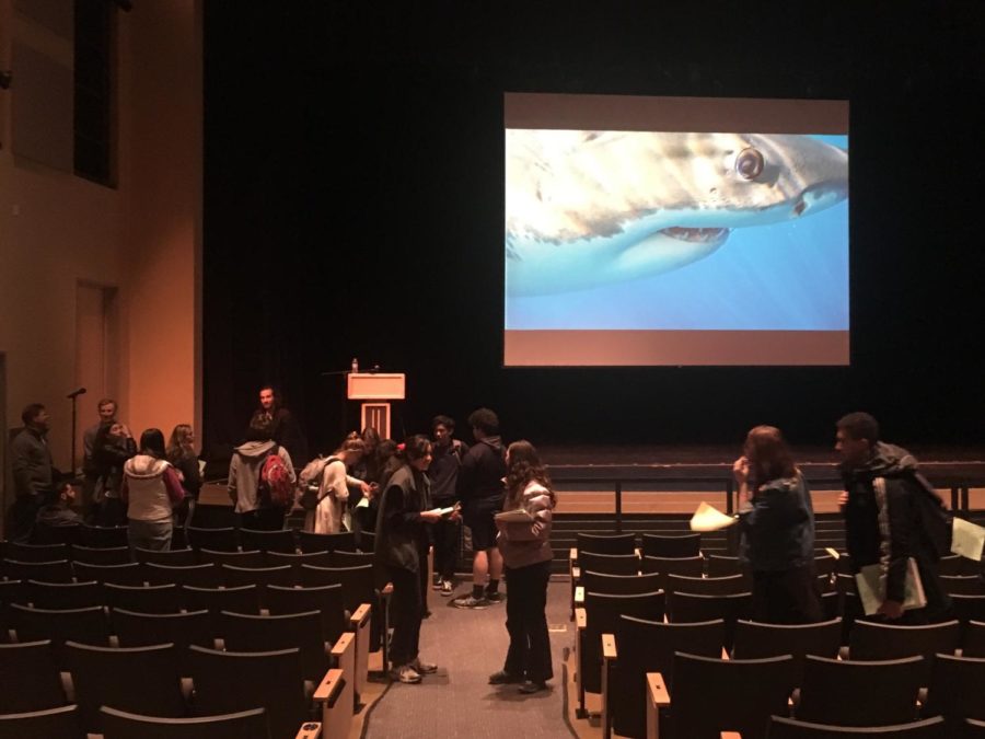Speaker, Skylar Thomas, answers questions after his presentation on sharks.