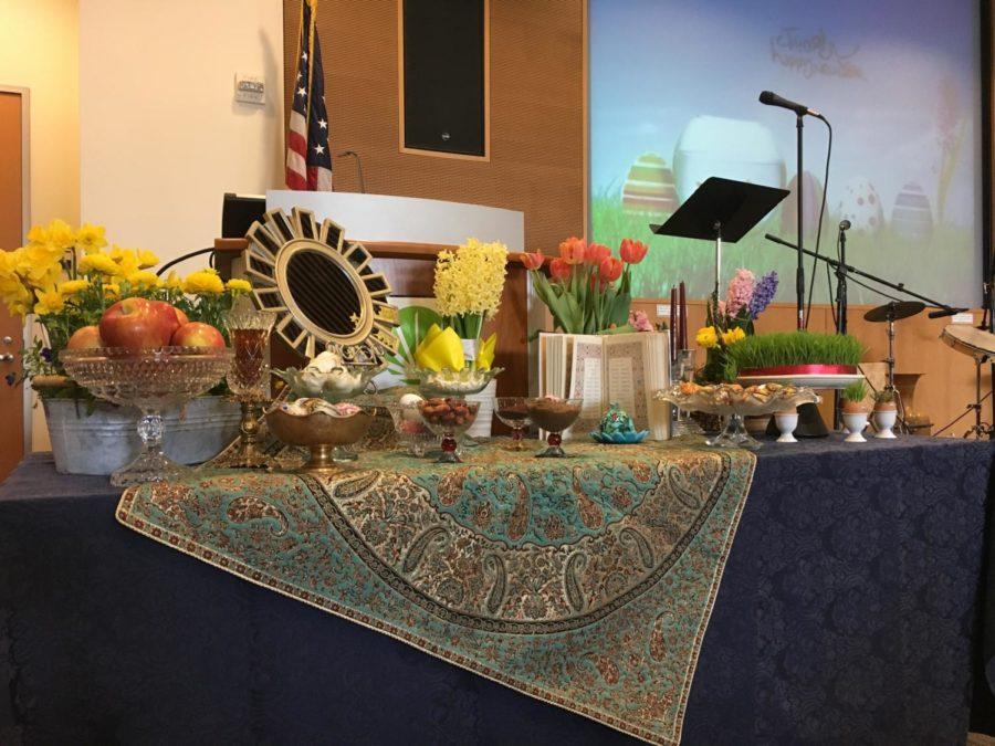 A colorful table was laid out at the San Mateo Library celebration of Nowruz.