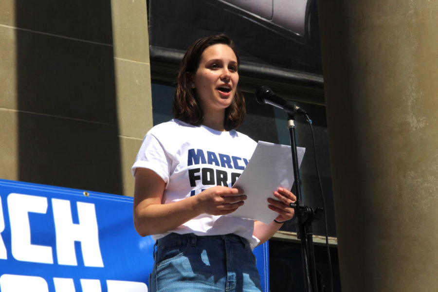 Sophie Penn, a rally organizer, gives the opening speech about the need for increased gun control.