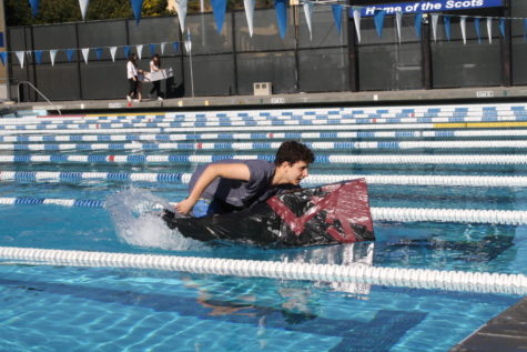 Sophomore Cameron Juliano races his way down the pool, trying to stay in the competition. 