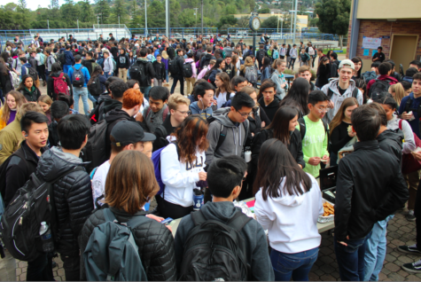 Students wait in front of Filipino Club to buy lumpia, a Filipino version of a fried spring roll.