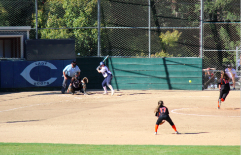 A Carlmont player gets ready to hit an incoming pitch.