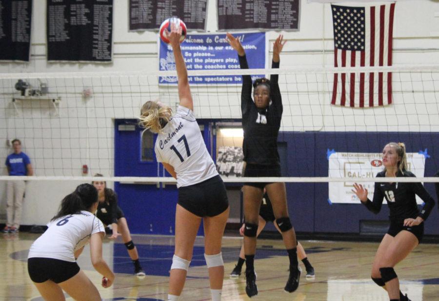 Carlmont senior Elizabeth Prozell spikes the ball in the final set.
