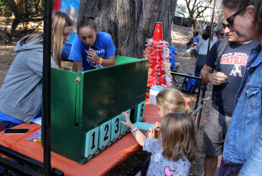 Children enjoy one of Key Clubs many games at the Save the Music festival. 