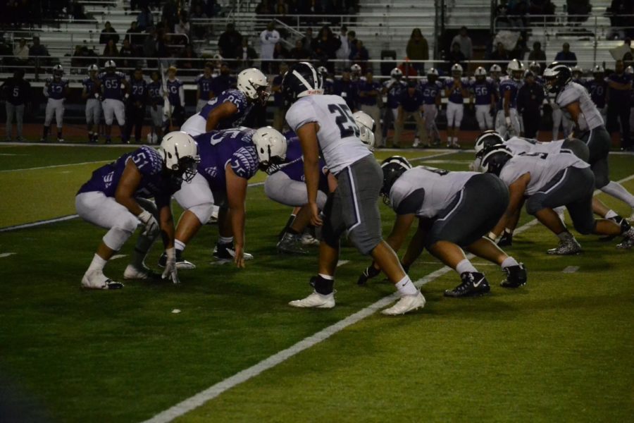The Scots defense waits for the snap. They forced eight turnovers in the game.