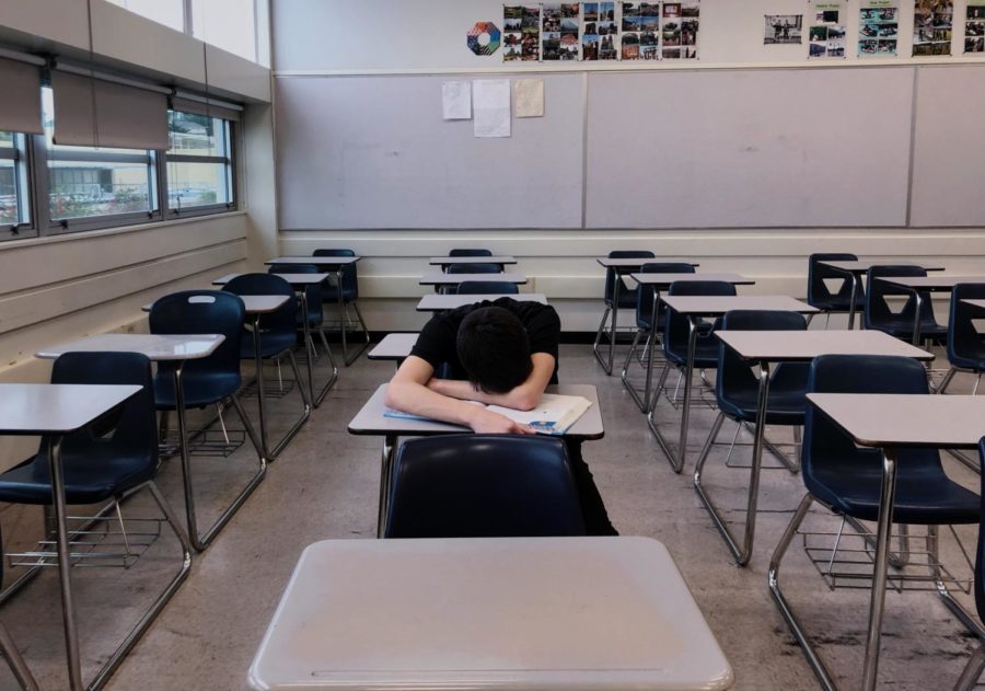Students often sneak in naps during class to make up for lost sleep the night before.