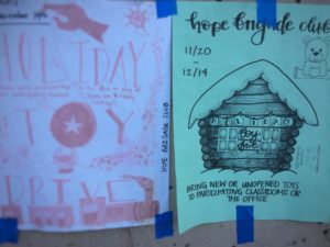 Hope Brigade Club advertises the toy drive by creating flyers and posting them around Carlmont. 