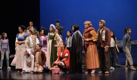 The Into the Woods cast performs on opening night.
