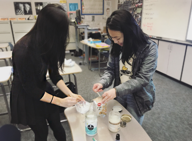 Club President Alyssa Nguyen and club member Serena Low make natural toothpaste in reusable containers
