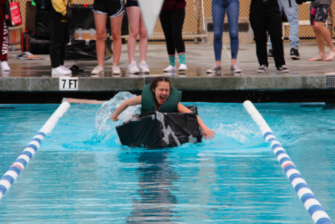 Donya Khonsari, a sophomore, excitedly races her boat down the pool.