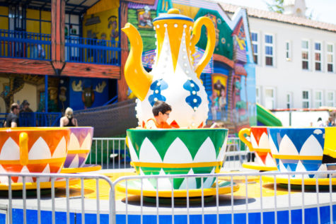 A boy enjoys the teacup ride at Mount Carmels Wild West Days 2019 festival.