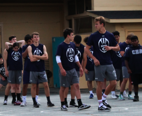 Carlmont Football team warms up for an early workout and practice.
