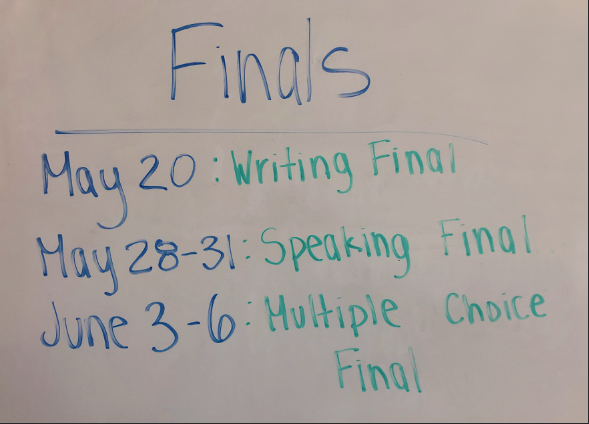 The dates of the Spanish II finals are posted in a classroom.