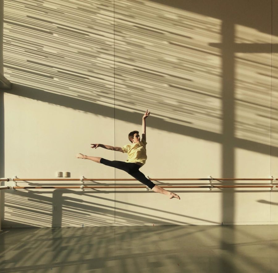 Sam Stampleman practices on strengthening his grand jeté in the dance studio.