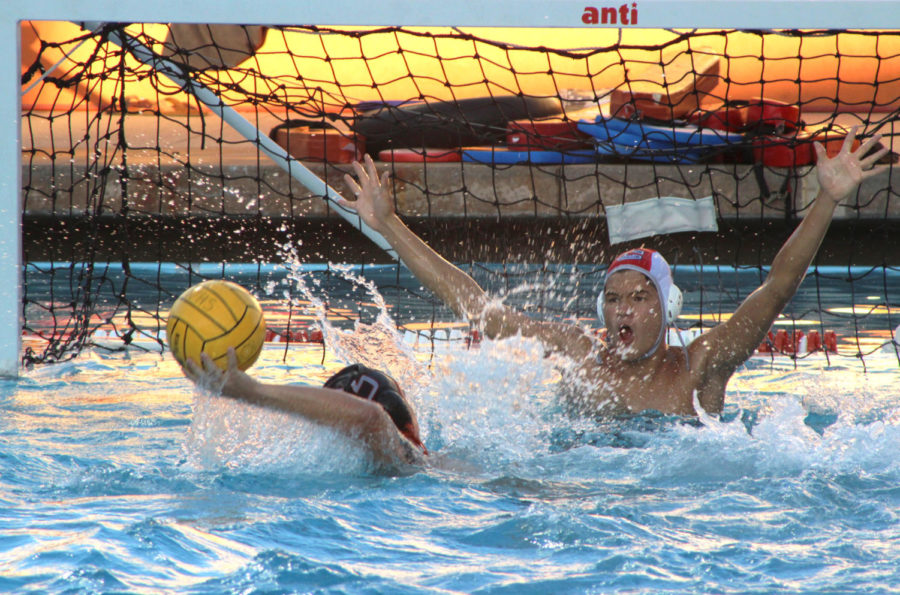 Carlmont varsity junior and goalie Thaddeus Duffy perseveres through a tough loss against Woodside. 