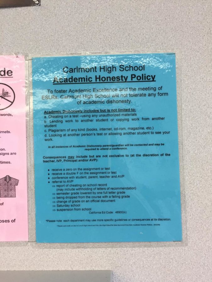 The Academic Honesty Policy hangs on the wall of Mr. Schoensteins class in D-7