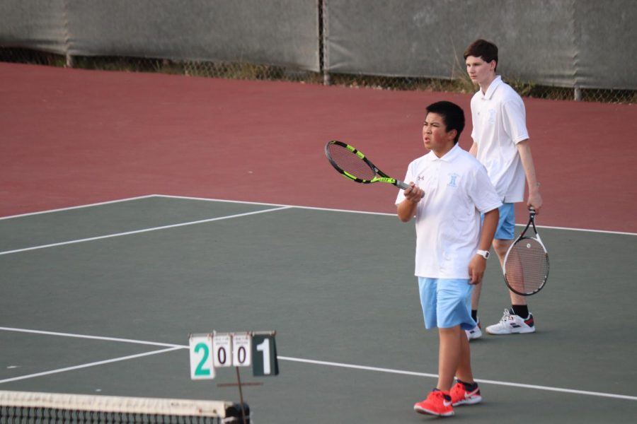 Hillsdale players are dissatisfied with a call during their match. 