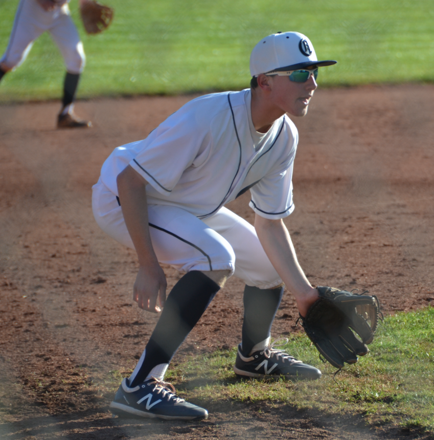 Brad Ayers gets his glove in the dirt as he gets ready to field a ground ball. 