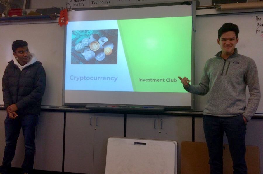 Club President Thaddeus Duffy and Vice President Tej Tummala teach club members about cryptocurrency, a digital currency that people obtain for different purposes.