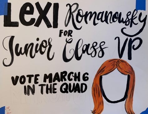 A poster convinces students to vote for sophomore Lexi  Romanowsky, one of the candidates in the election.
