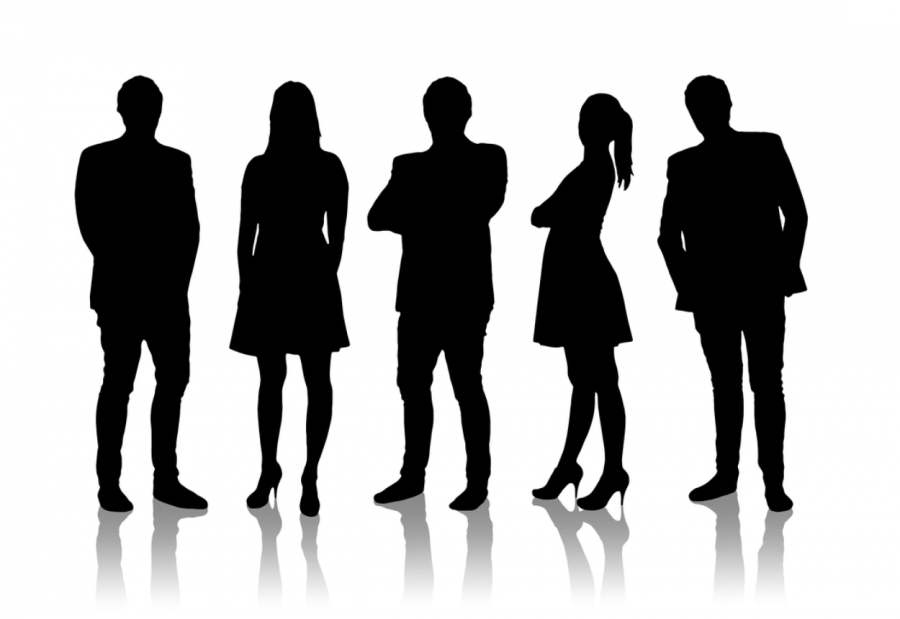A group of silhouetted, featureless people gather, their identities unknown.