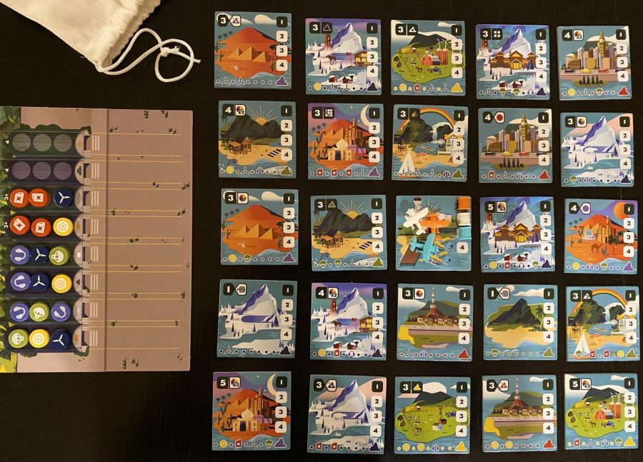 Wayfinders+is+set+up+and+ready+to+play.++The+tiles+appear+to+represent+different+cities%2C+and+there+are+enough+tiles+to+almost+play+two+games+with+all+different+ones.