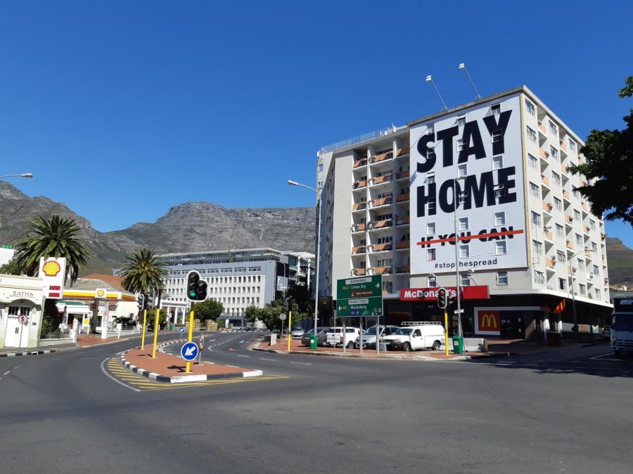 A billboard in Cape Town, South Africa, tells residents to stay home to prevent the spread of COVID-19.