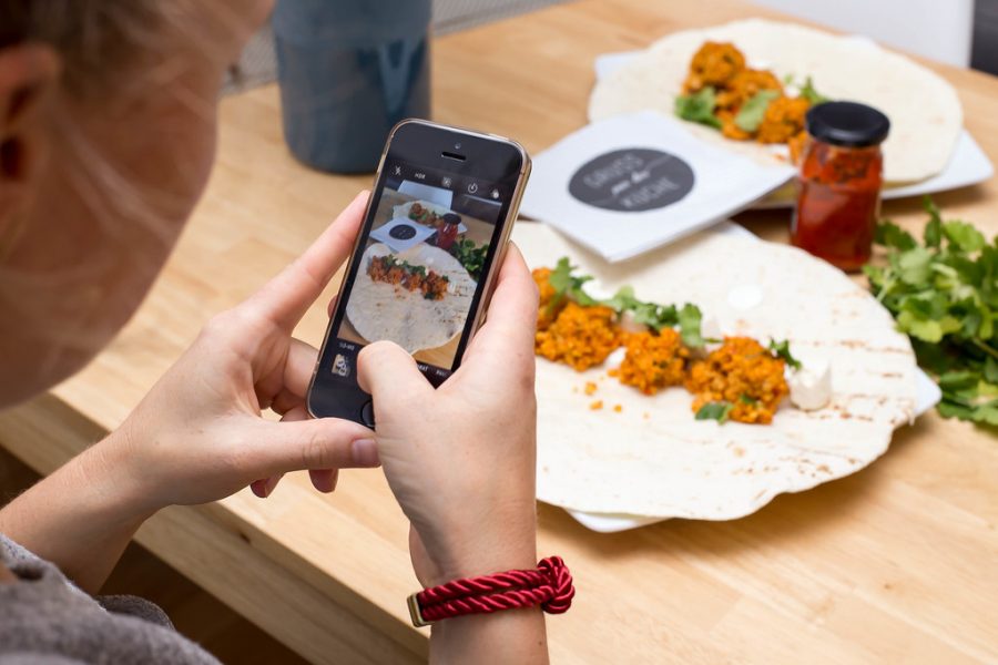 It has become common on social media to post pictures of experiences or food. 