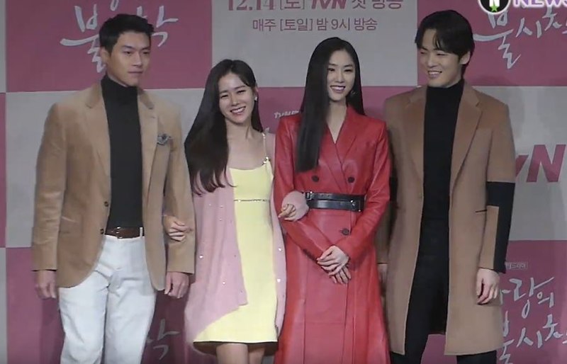 The cast of Crash Landing on You attends a promotional event (from left to right: Hyun Bin (Ri Jeong Hyeok), Son Ye-Jin (Yoon Se-Ri), Seo Ji-Hye (Seo Dan), and Kim Jung-Hyun (Gu Seung-Joon)).