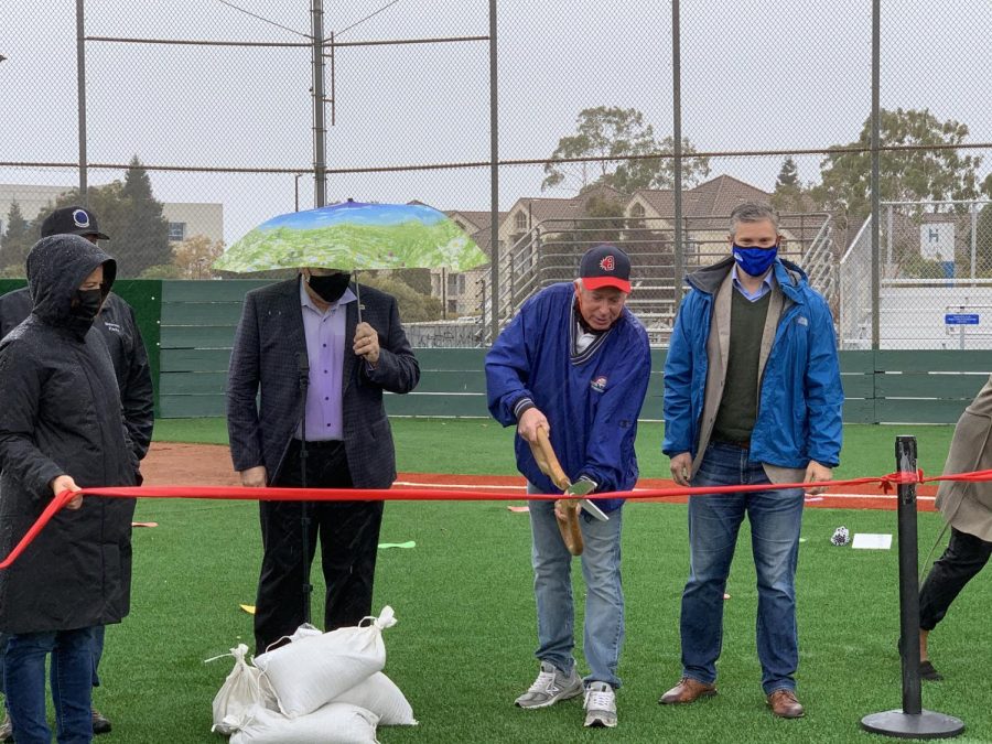 Belmont Mayor Warren Lieberman cuts the ribbon to the newly renovated North Field.