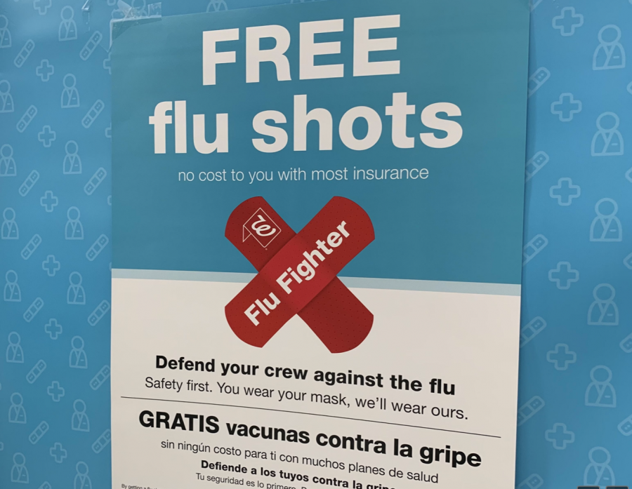 Local pharmacies promote the influenza vaccine to customers.