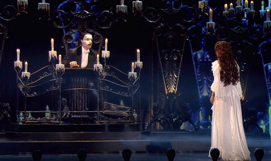 Christine (Sierra Boggess) is led beneath the opera house, to the lair of the dreaded Phantom of the Opera (Ramin Karimloo).