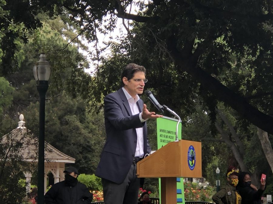 State Senator Josh Becker addressed the crowd, showing his support for the AAPI community while emphasizing the power of unity and the importance of taking a stance against hate crimes.