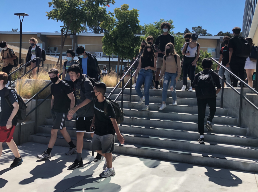 Carlmont students walk to their next class during passing period after the entire student body returned to school in August for the new school year.