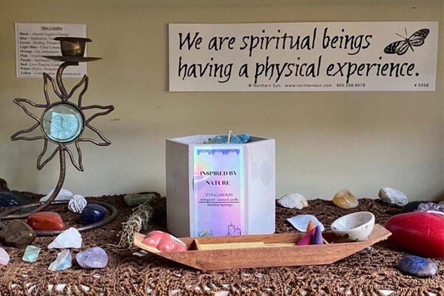 The altar of María Valle-Remond, a senior who uses any pronouns, includes spiritual items such as crystals, candles, and incense. Students like Valle-Remond notice a connection between their spiritual and LGBTQ+ identities.