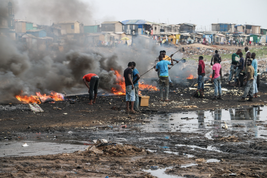 Ghanaian people burn e-waste at Agbogbloshie to obtain the valuable metals inside.