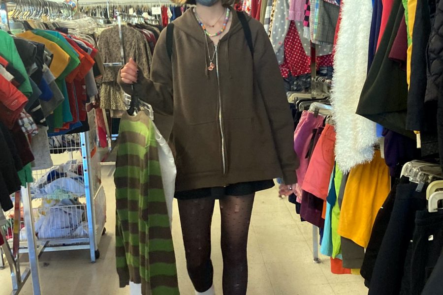 High school student Helen Furman finds new clothing pieces at Thrift Center Thrift Store in San Carlos during the weekend. “Exploring the thrift store is one of my new favorite hobbies,” Furman said.