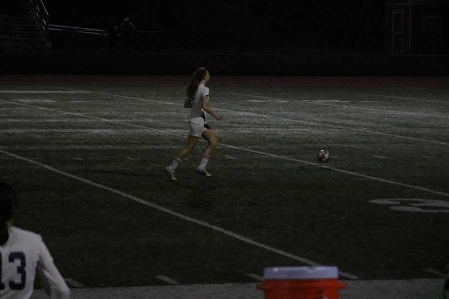 Allyson Blucher takes the ball down the field unguarded
