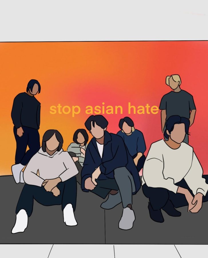 TikTok influencers, the North Star Boys, pose in front of a Stop Asian Hate sign.