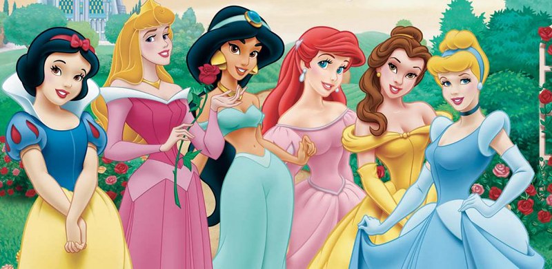 The Disney princesses pose in their trademark gowns.