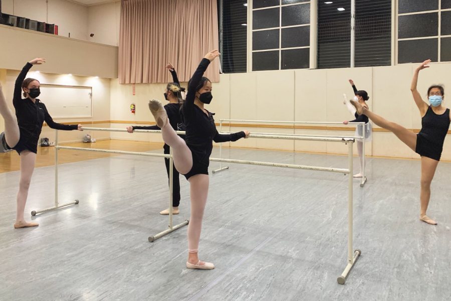Dancers suspend their legs in the air at Heartbeat Dance Academy.
