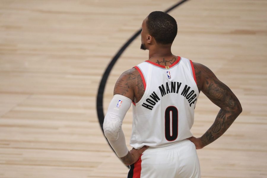 Damian+Lillard%2C+a+point+guard+for+the+Portland+Trailblazers%2C+chose+to+wear+%E2%80%9CHow+Many+More%E2%80%9D+while+playing+in+the+NBA+Bubble.