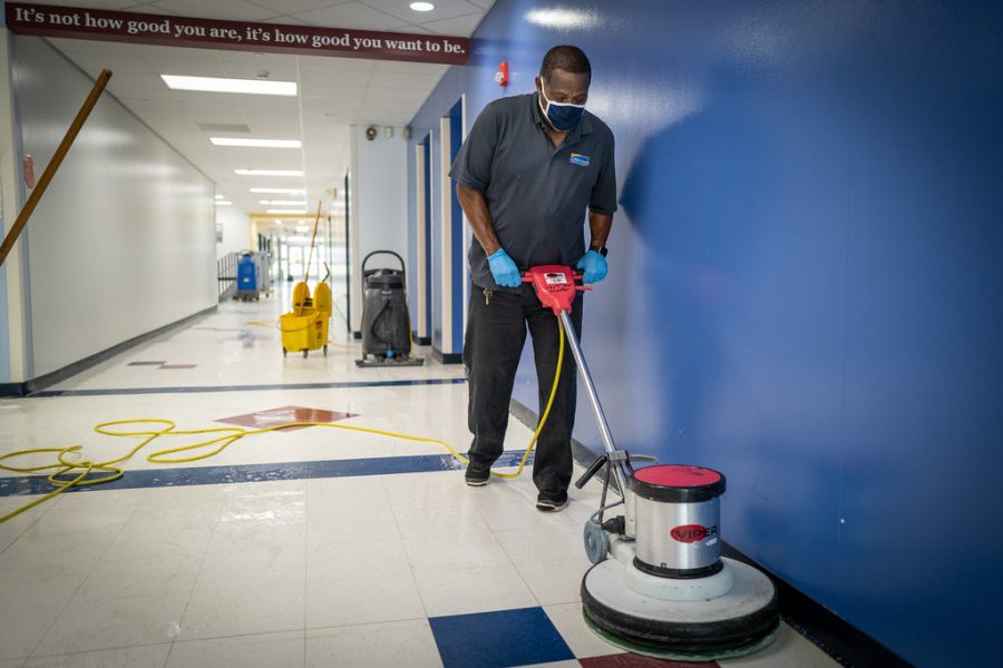 Custodians often work lengthy hours each day to ensure campuses are clean and safe for students. 