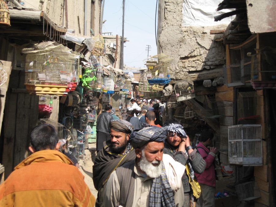 Afghans walk the streets of Kabul.