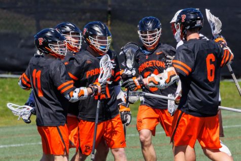 Princeton lacrosse players celebrate their 17-9 victory over Brown.