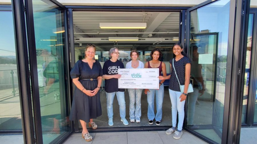 Members of Carlmonts Girls Who Code Club received a donation from Rachele Schainker at CMIT Solutions of San Mateos customer appreciation ceremony.