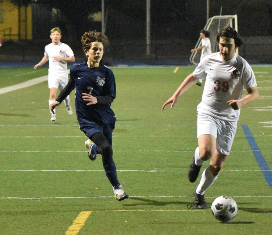 Pano Koutoulas runs after the ball in Carlmonts 2-0 victory at home against Burlingame.